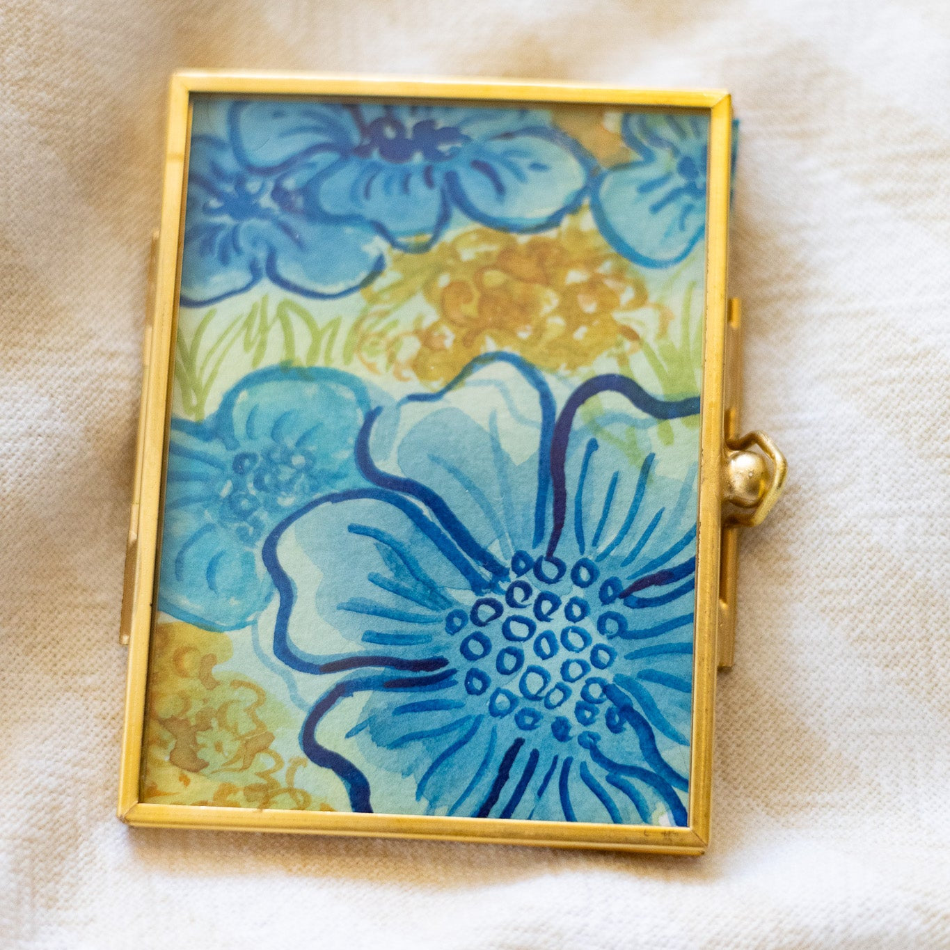 Decorative gold frame with floral painting 