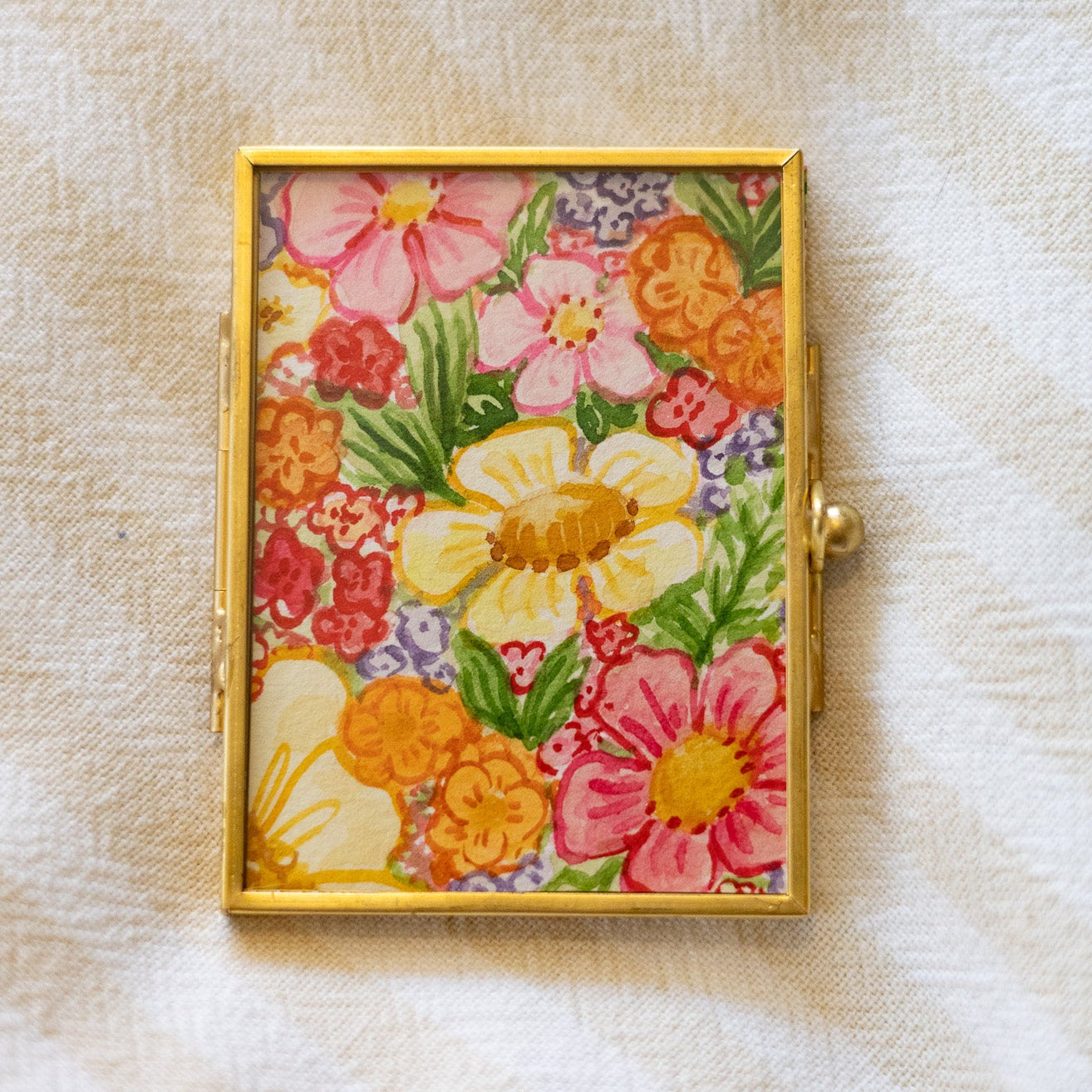 Decorative gold frame with floral painting 